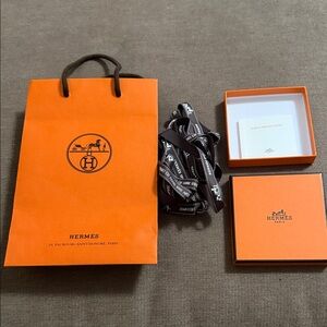 Hermès Orange Gift Bag with Black Ribbon
